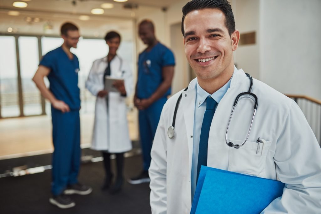 Successful handsome doctor with a beaming smile